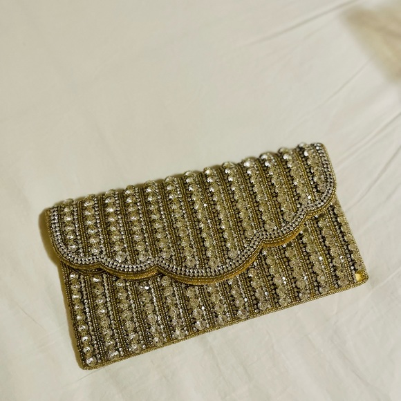 Golden rhinestone purse